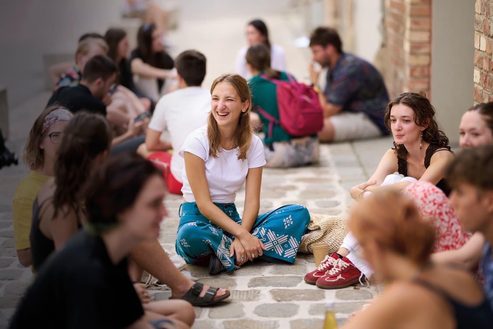 Casual Students Sitting in Group
